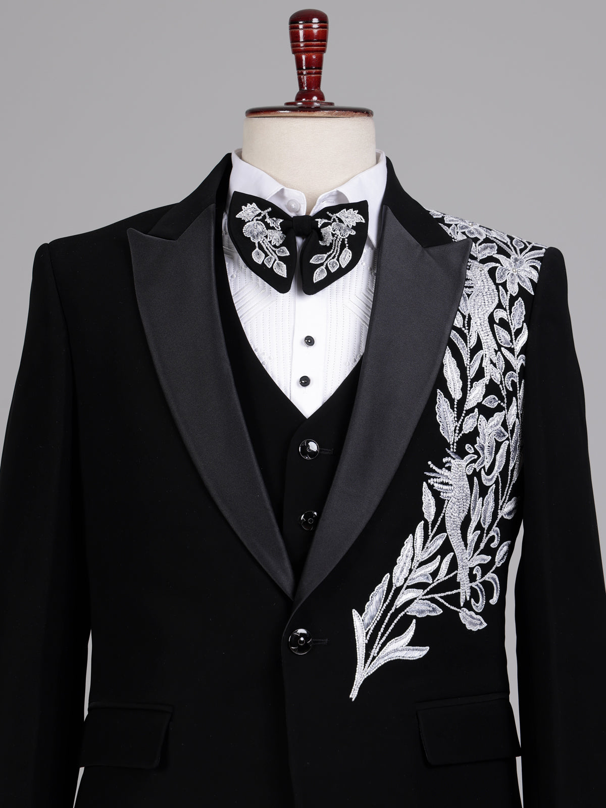 Black terry rayon tuxedo suit with floral cutdana embroidery