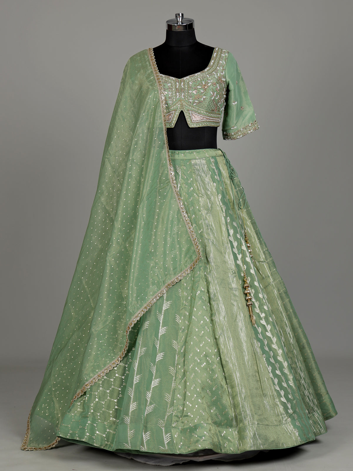Pista green banarasi tissue silk designer lehenga with dupatta