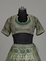 Mehendi green banarasi silk lehenga choli with embellished dupatta