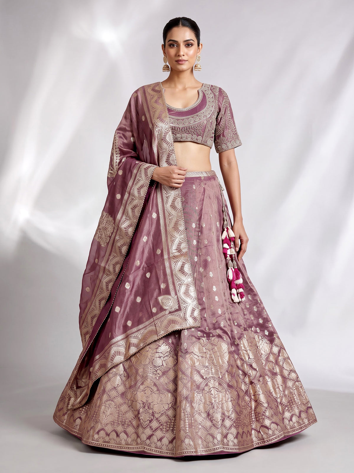 Purple banarasi silk lehenga choli with zari and mirror embellishments