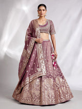 Purple banarasi silk lehenga choli with zari and mirror embellishments