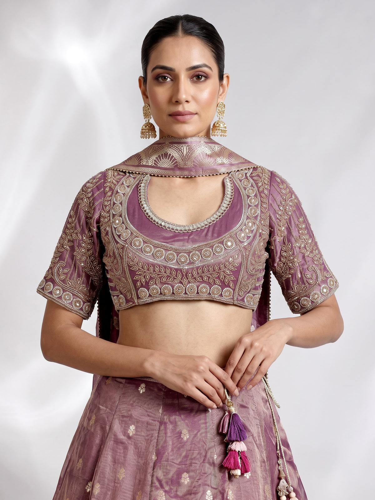 Purple banarasi silk lehenga choli with zari and mirror embellishments