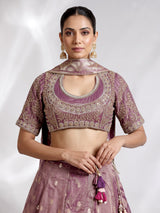 Purple banarasi silk lehenga choli with zari and mirror embellishments