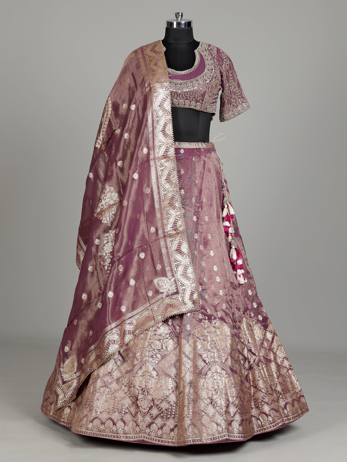 Purple banarasi silk lehenga choli with zari and mirror embellishments