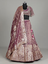 Purple banarasi silk lehenga choli with zari and mirror embellishments