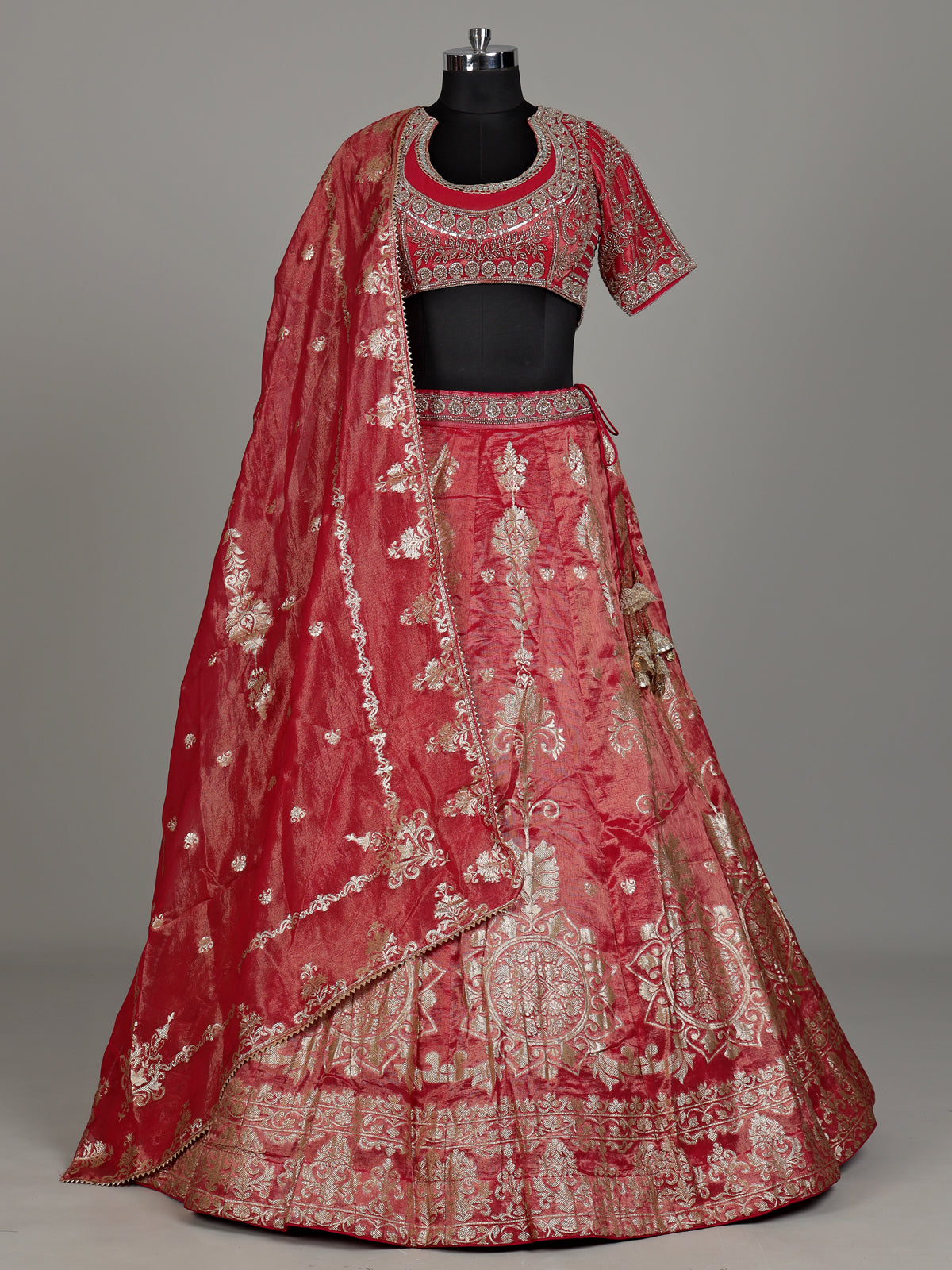 Rani pink banarasi silk lehenga choli with embellished dupatta