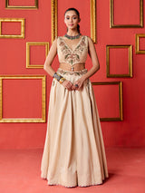 Beige silk designer wedding lehenga choli with tassel accents dupatta