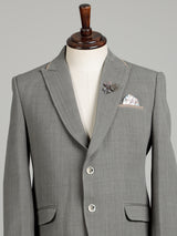 Light grey single-breasted blazer with floral brooch