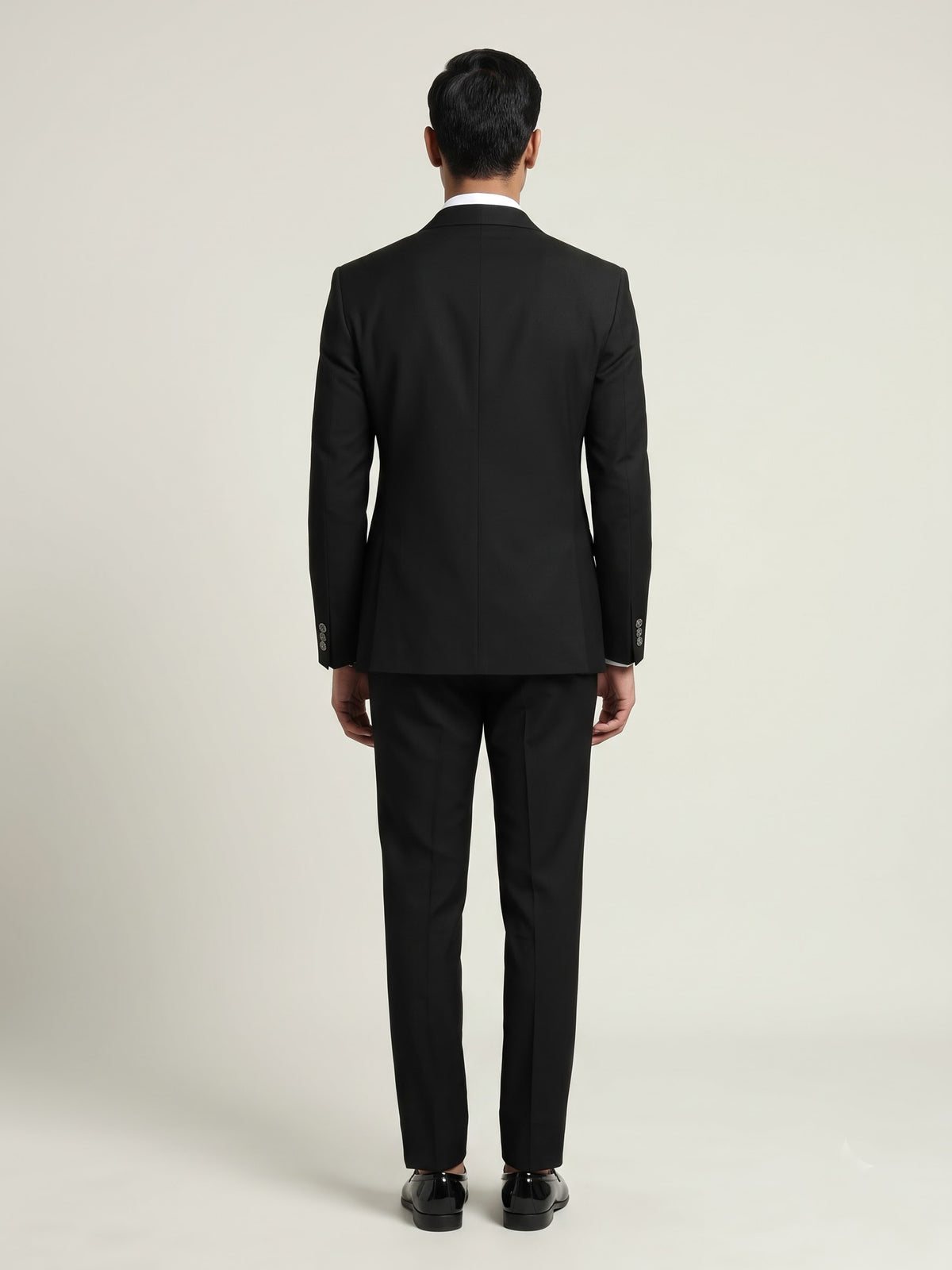 Jet black double-breasted tuxedo suit with crystal-bead piping