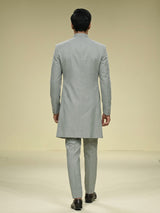 Pista green embellished crest motif indowestern suit for mens
