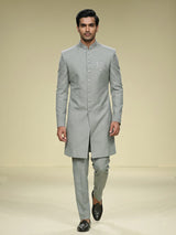 Pista green embellished crest motif indowestern suit for mens