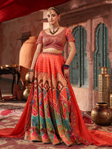 Red traditional print lehenga choli with elegant embellished dupatta