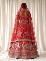Red raw silk bridal lehenga with double dupatta and art motifs