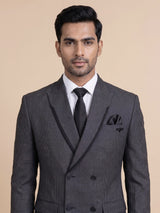 Charcoal grey double-breasted suit with black satin lapels