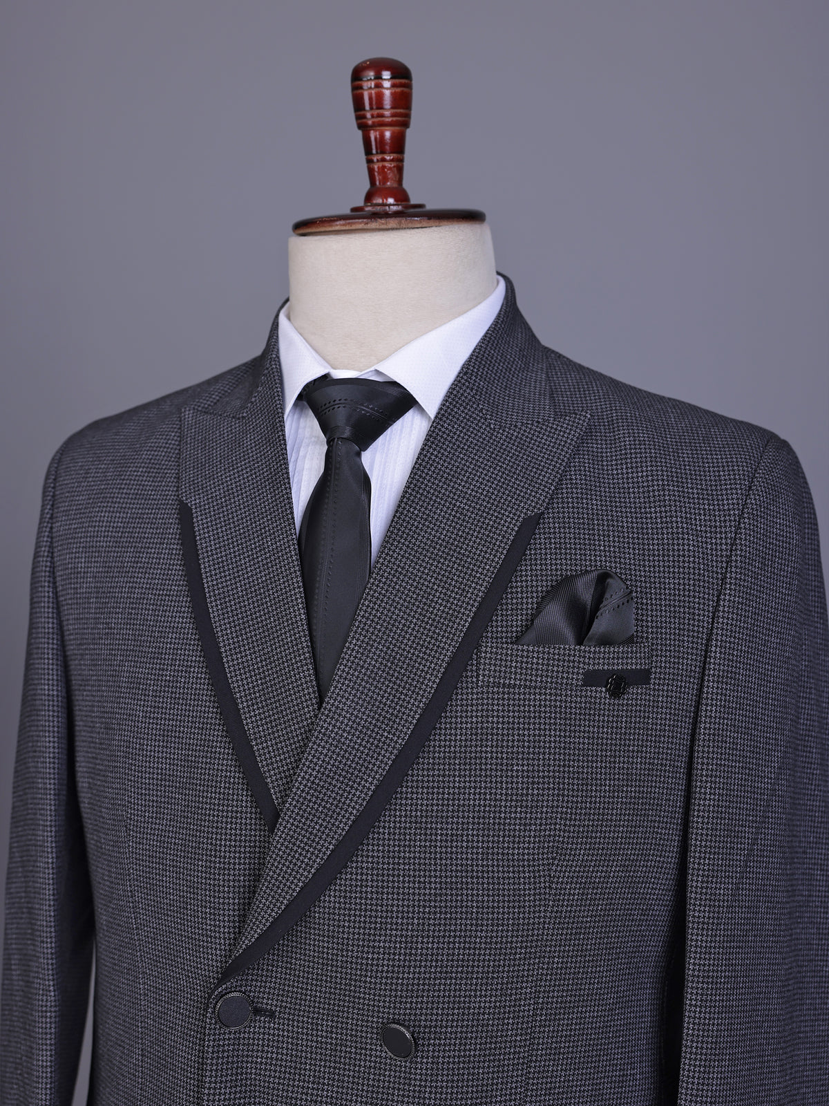 Charcoal grey double-breasted suit with black satin lapels
