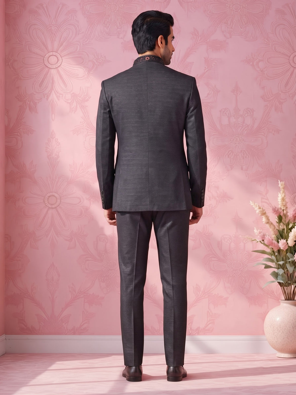 Jet black textured jodhpuri suit for mens with crest motif