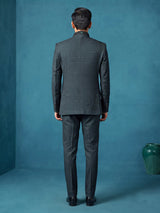 Deep emerald green textured jodhpuri suit for mens with crest