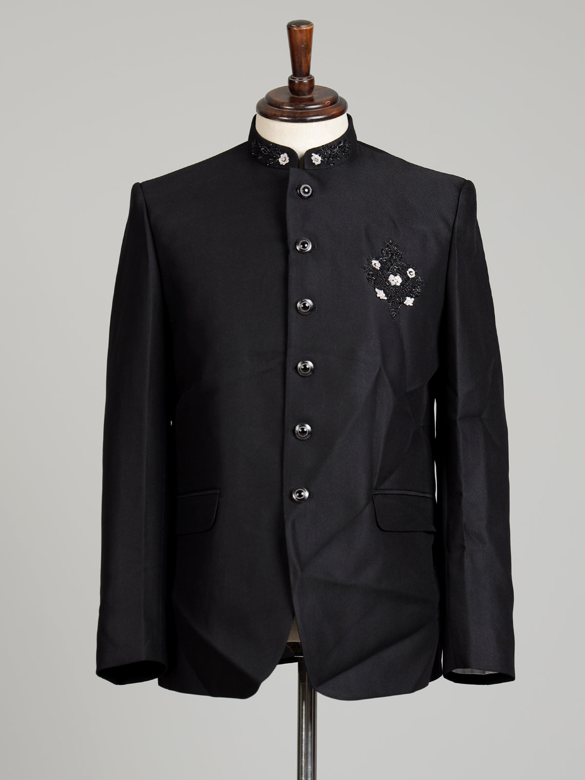 Black mens floral crest embroidered poly-viscose jodhpuri suit