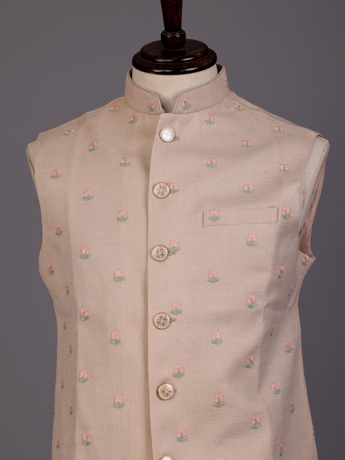 Light peach textured butti waistcoat with metallic buttons for mens