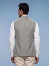 Grey textured safari waistcoat with zardosi embellished chest pocket