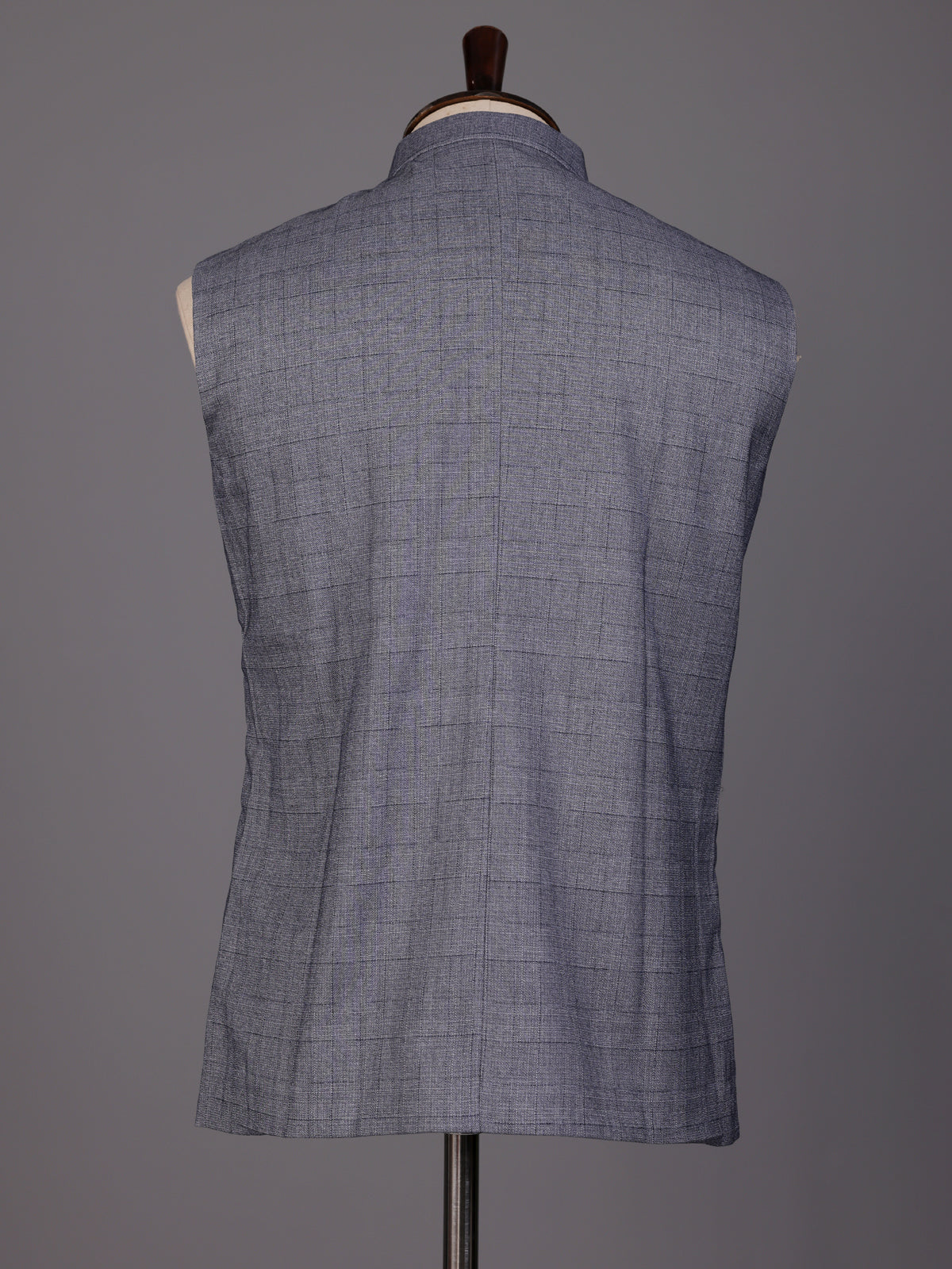 Grey micro-textured waistcoat with metallic brooch for mens weddings