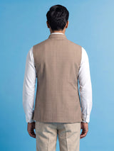 Dark beige textured waistcoat with zardosi safari pocket detailing