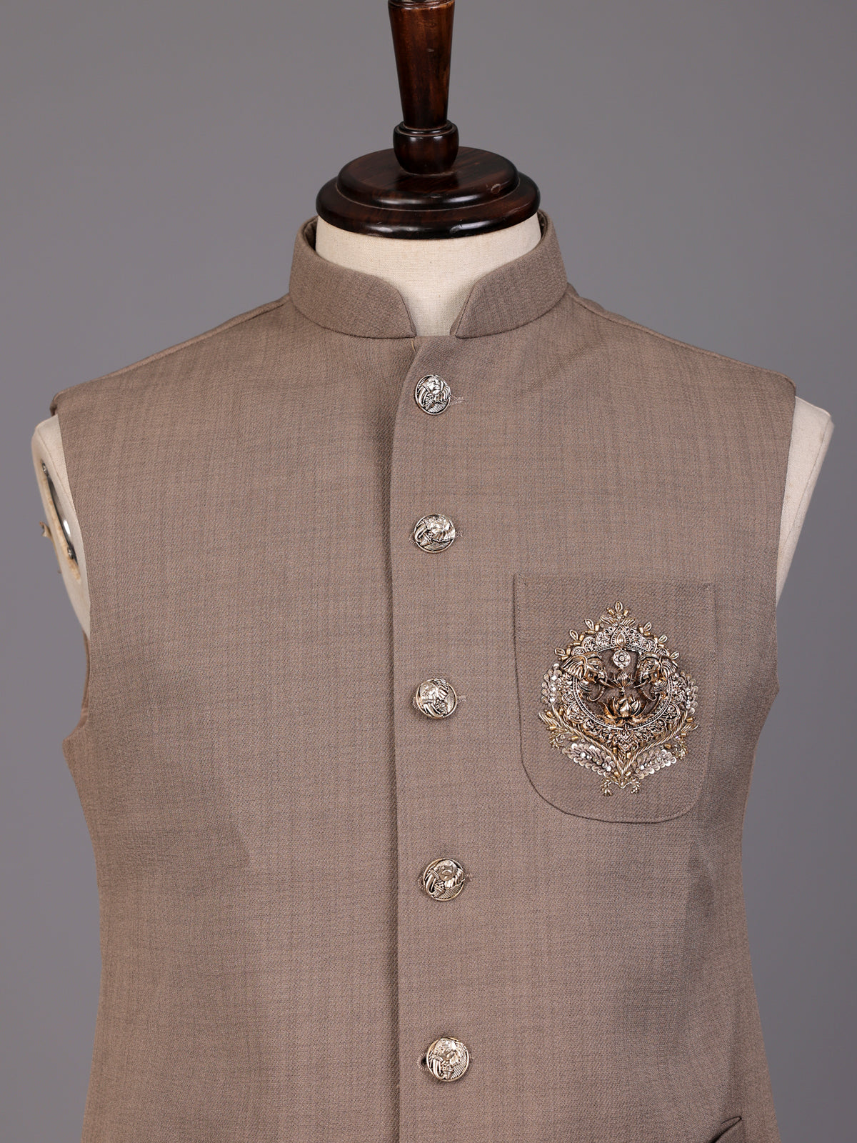 Dark beige textured waistcoat with zardosi safari pocket detailing
