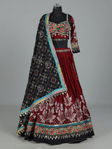 Maroon cotton silk chaniya choli with cowrie shell embellishments