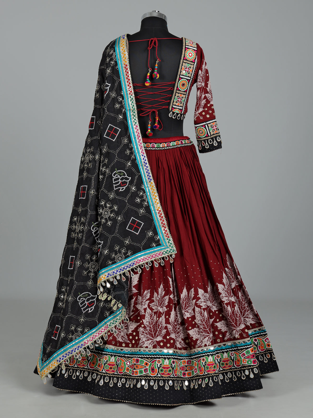 Maroon cotton silk chaniya choli with cowrie shell embellishments
