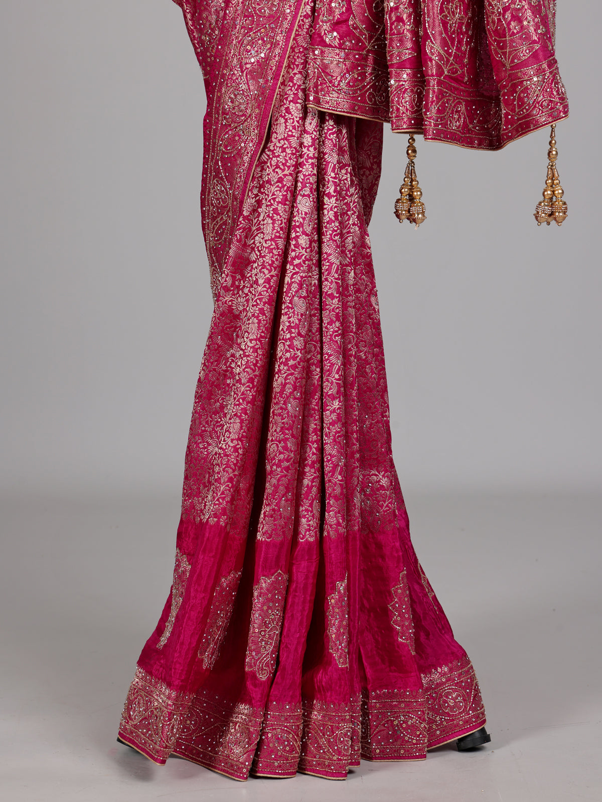 Rani pink metallic embellished dola silk saree