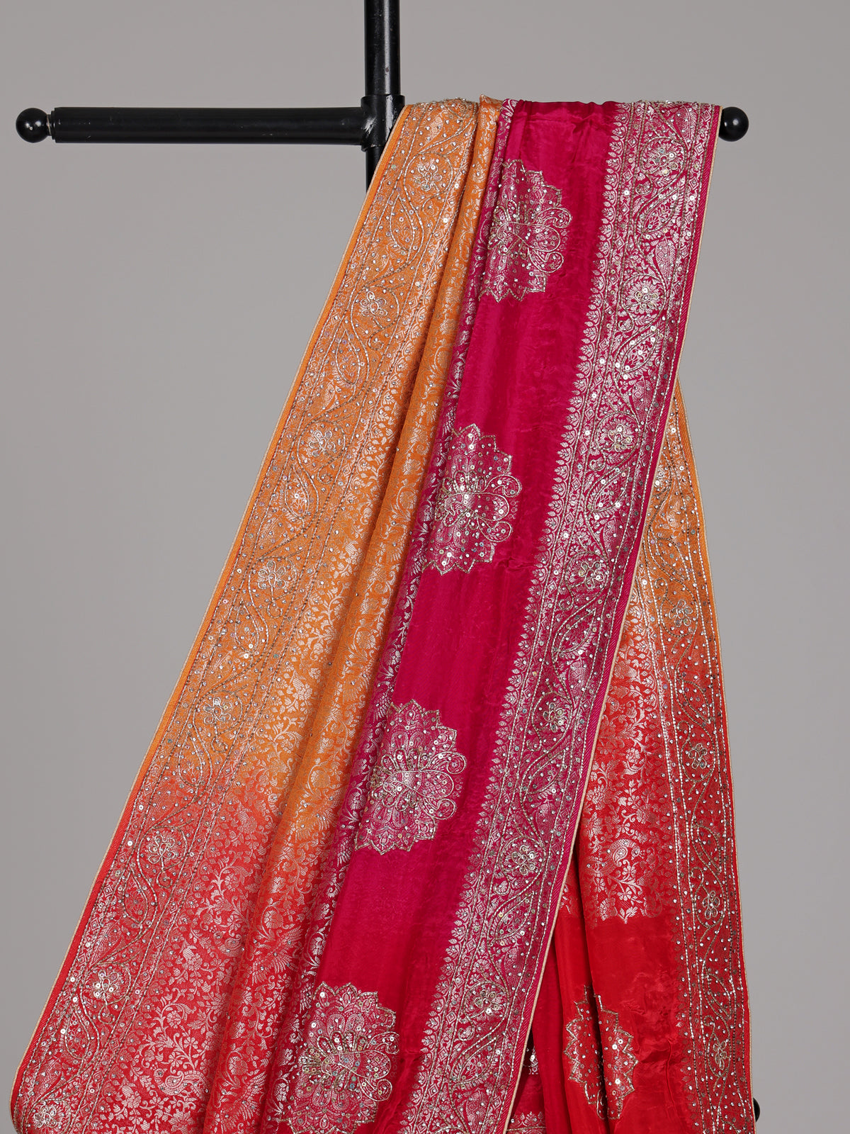 Red and yellow shaded embellished dola silk saree