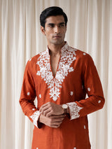 Rust orange silk kurta suit with floral bead embellishments