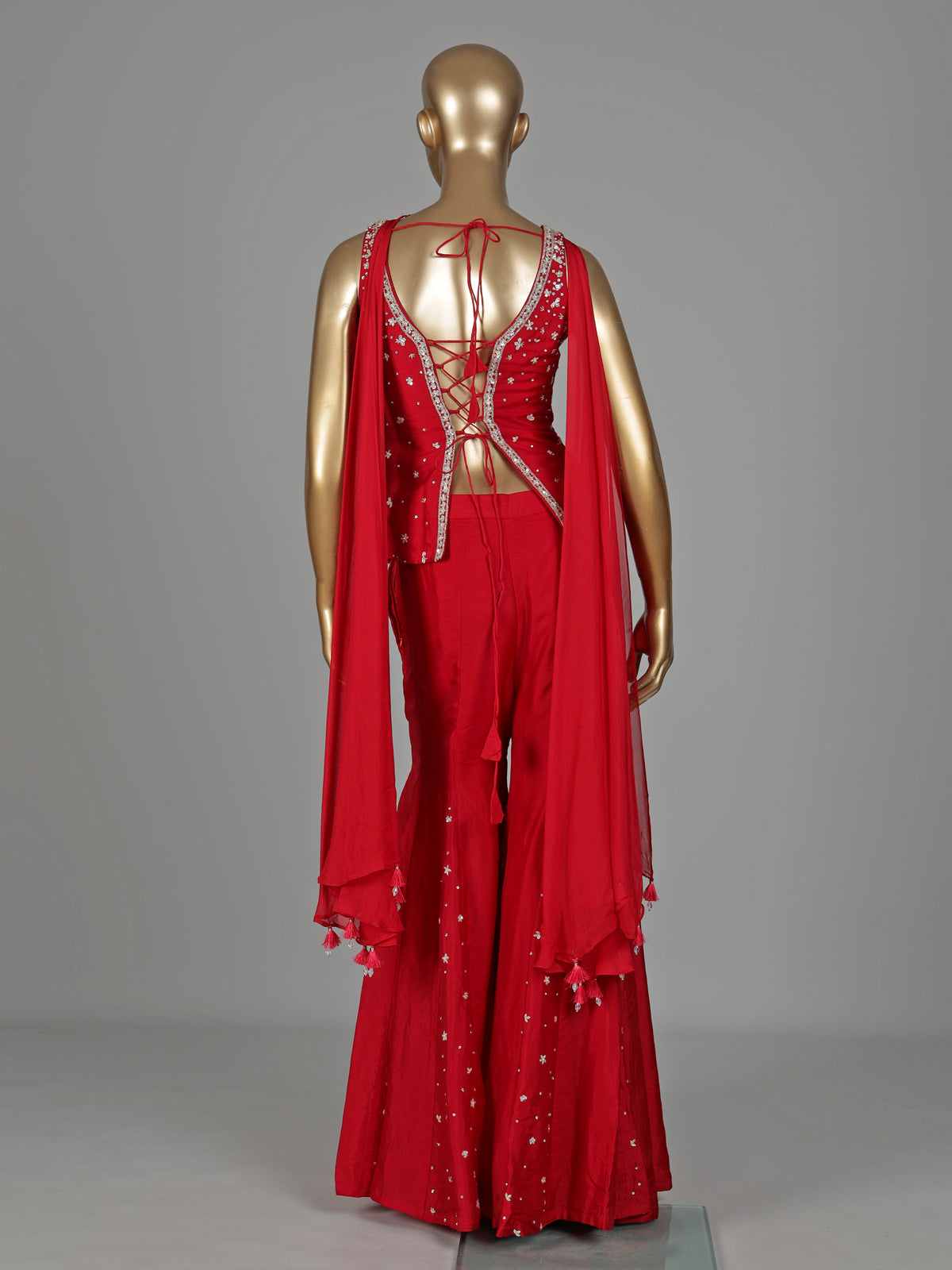 Red silk designer palazzo suit with bead embellishments