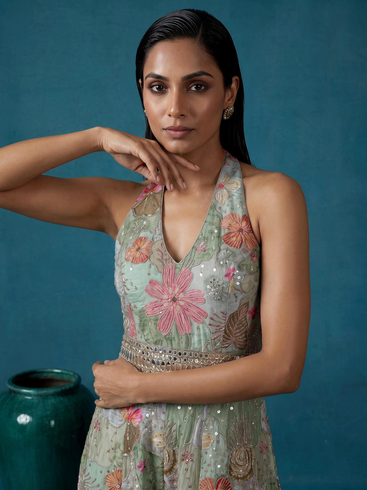 Pista green silk designer jumpsuit with floral resham embellishments