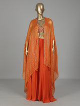 Orange satin silk designer salwar suit with embellished shrug