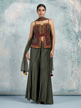 Mehendi green silk designer palazzo suit with festive tassel embellishments