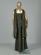 Mehendi green silk designer palazzo suit with festive tassel embellishments