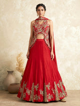Red designer silk lehenga choli with tassel embellishments