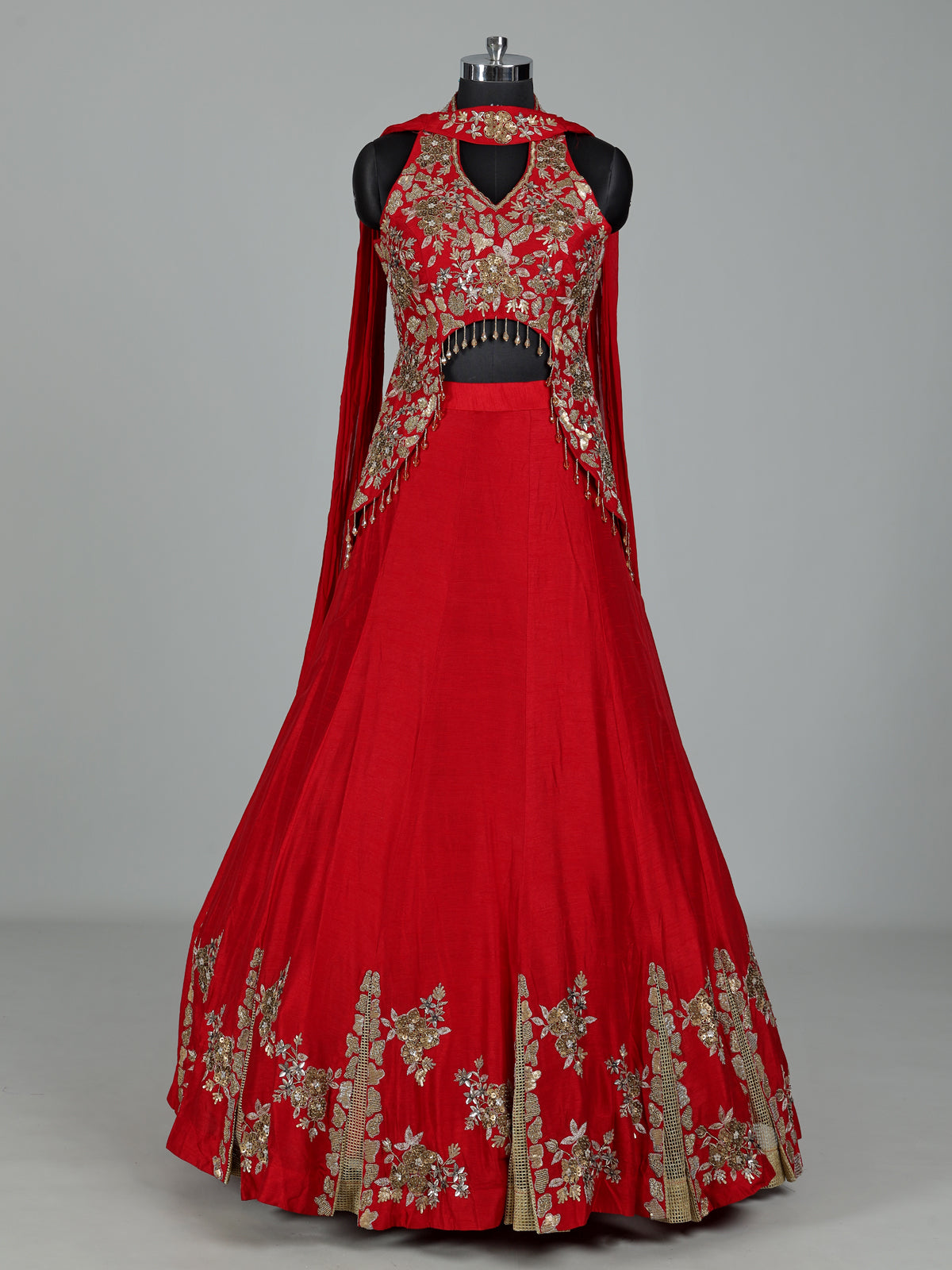 Red designer silk lehenga choli with tassel embellishments