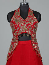 Red designer silk lehenga choli with tassel embellishments
