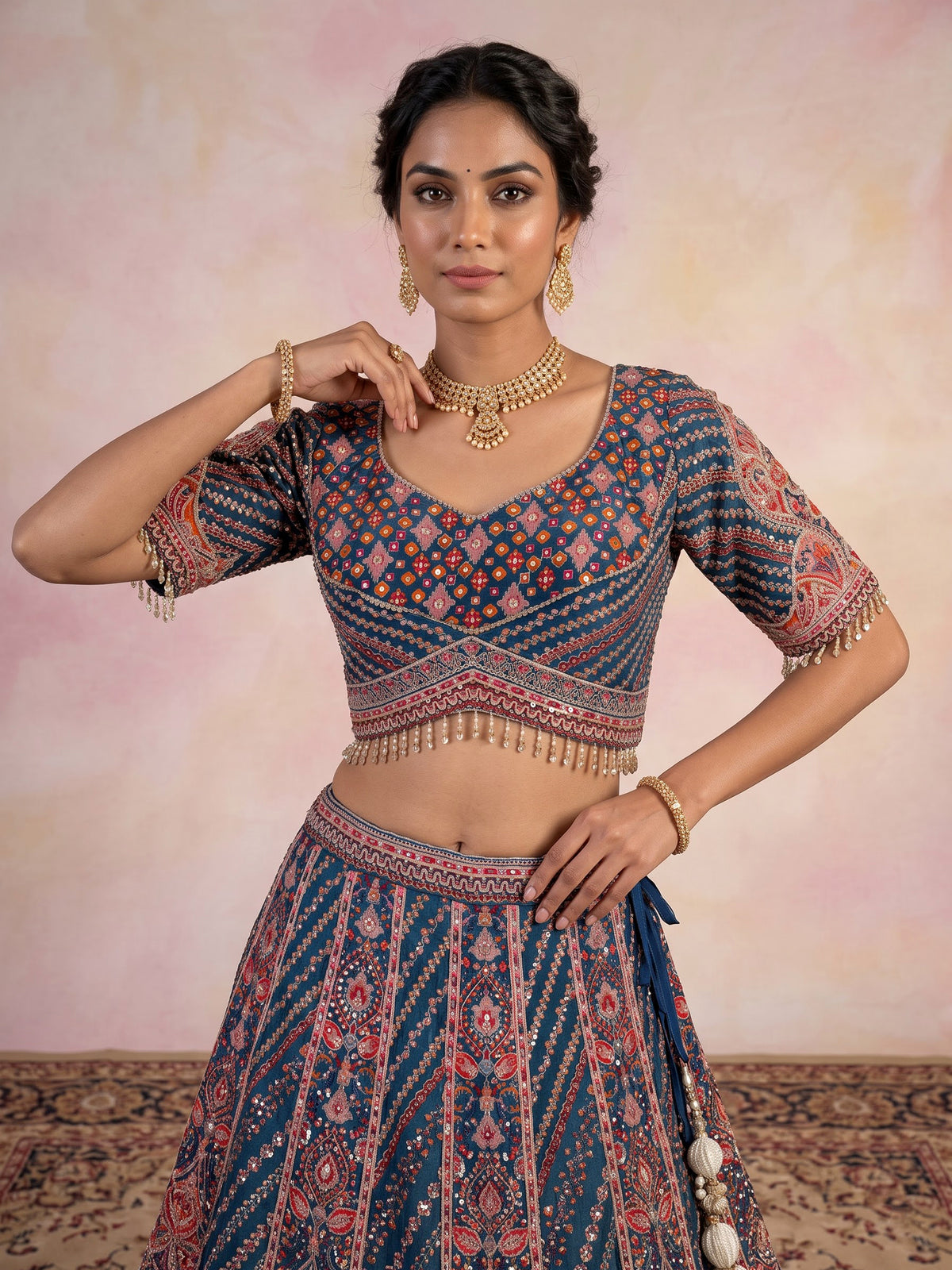Rama blue silk lehenga choli with chevron panels and embellishments