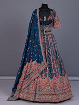 Rama blue silk lehenga choli with chevron panels and embellishments