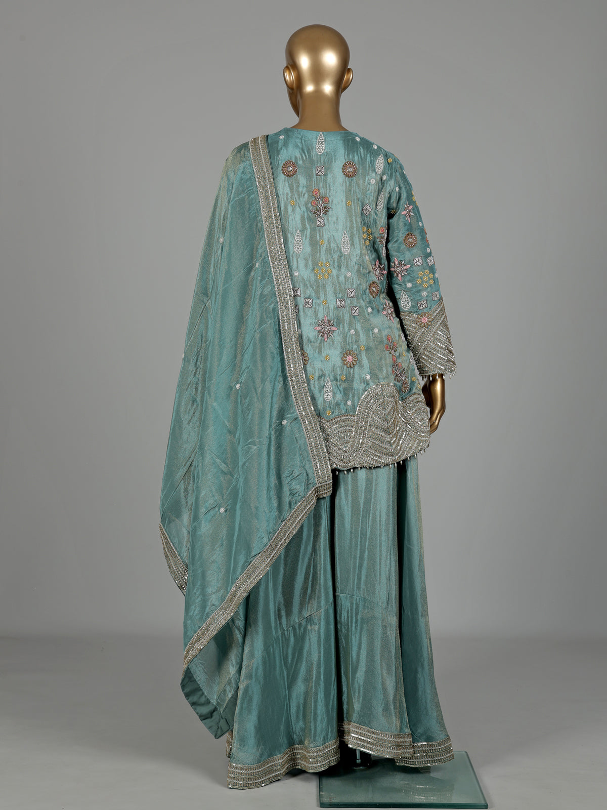 Pastel mint blue silk palazzo suit with sequins and tassel detailing