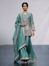 Pastel mint blue silk palazzo suit with sequins and tassel detailing