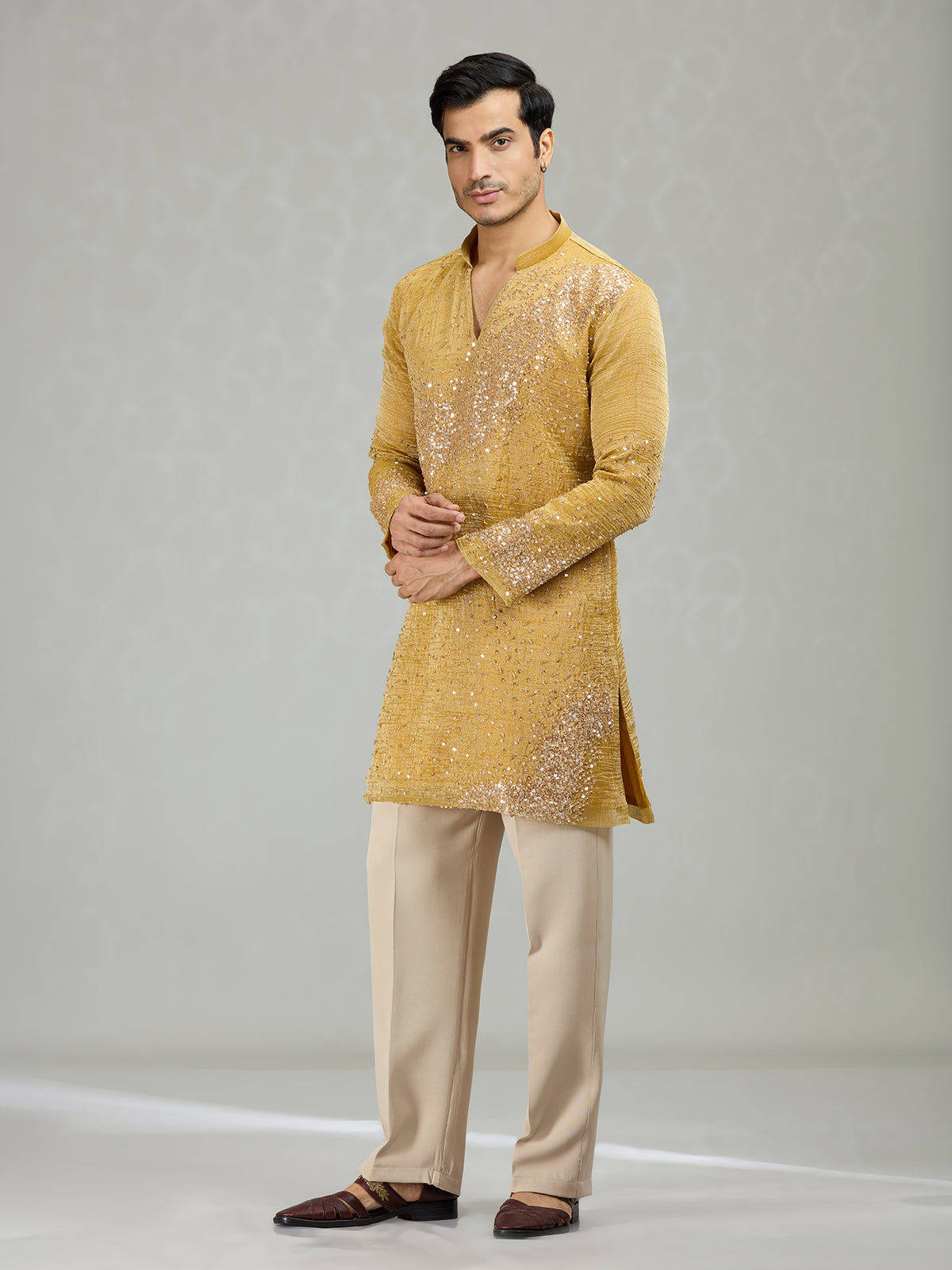 Yellow radiant wave ornamentation men kurta suit