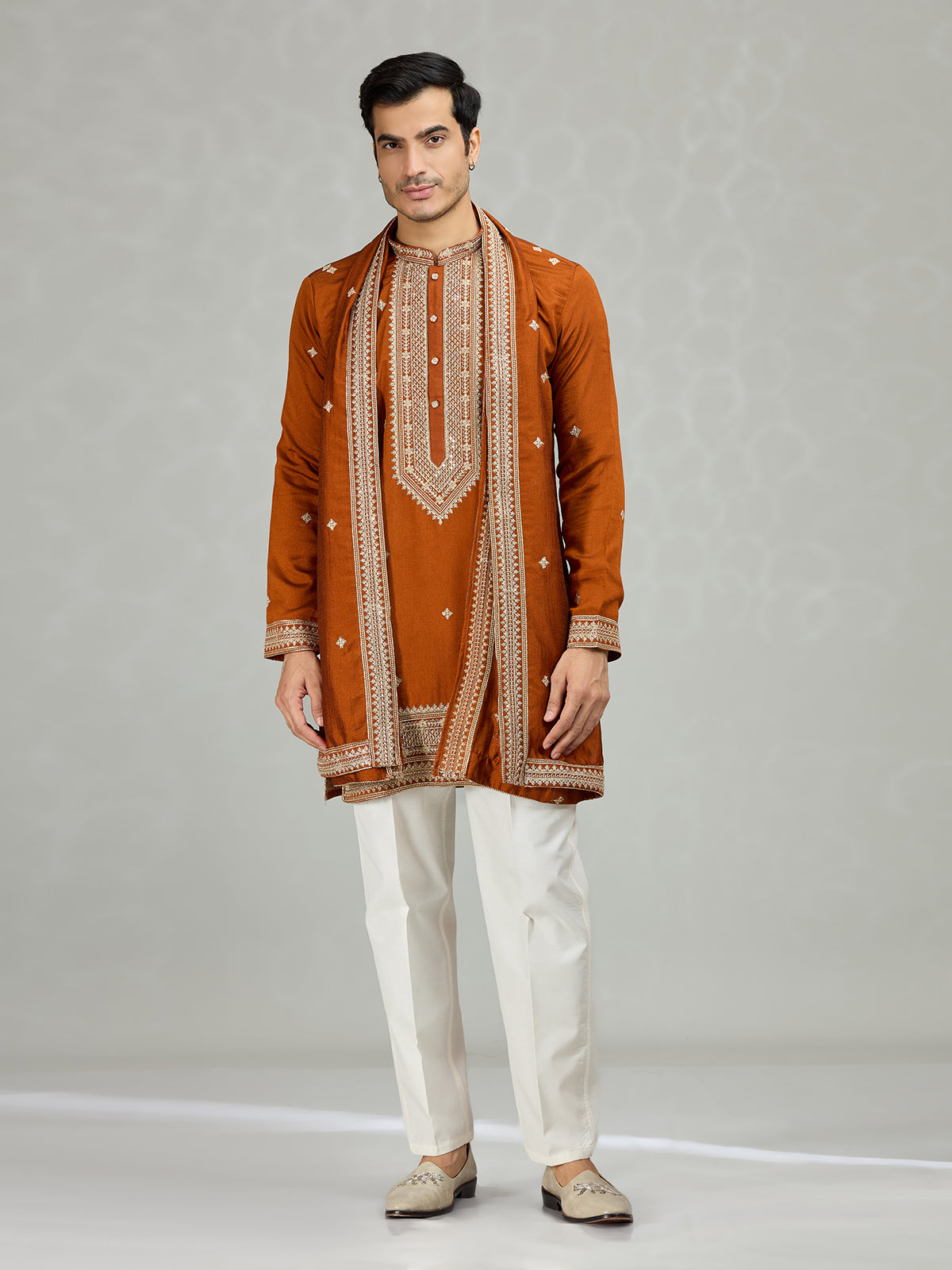 Rust orange statement embroidered men kurta suit