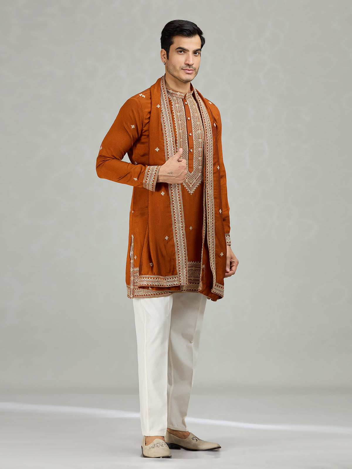 Rust orange statement embroidered men kurta suit