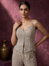 Beige georgette pakistani salwar suit with sparkling mirror embellishments