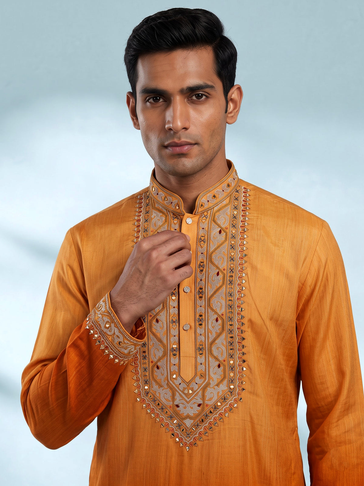 Orange silk blend mens kurta suit with mirror zardozi chevron yoke