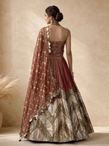 Rust red silk lehenga choli with intricate aabla embroidery